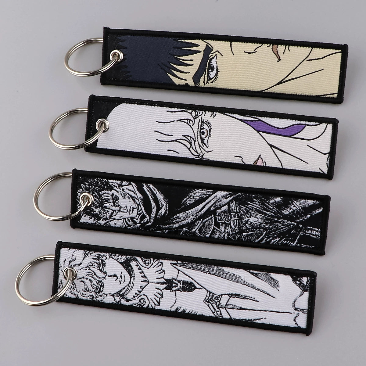 Berserk & JoJo Anime Woven Keychain – Fabric Key Ring with Berserk-Inspired Decorative Chain,026